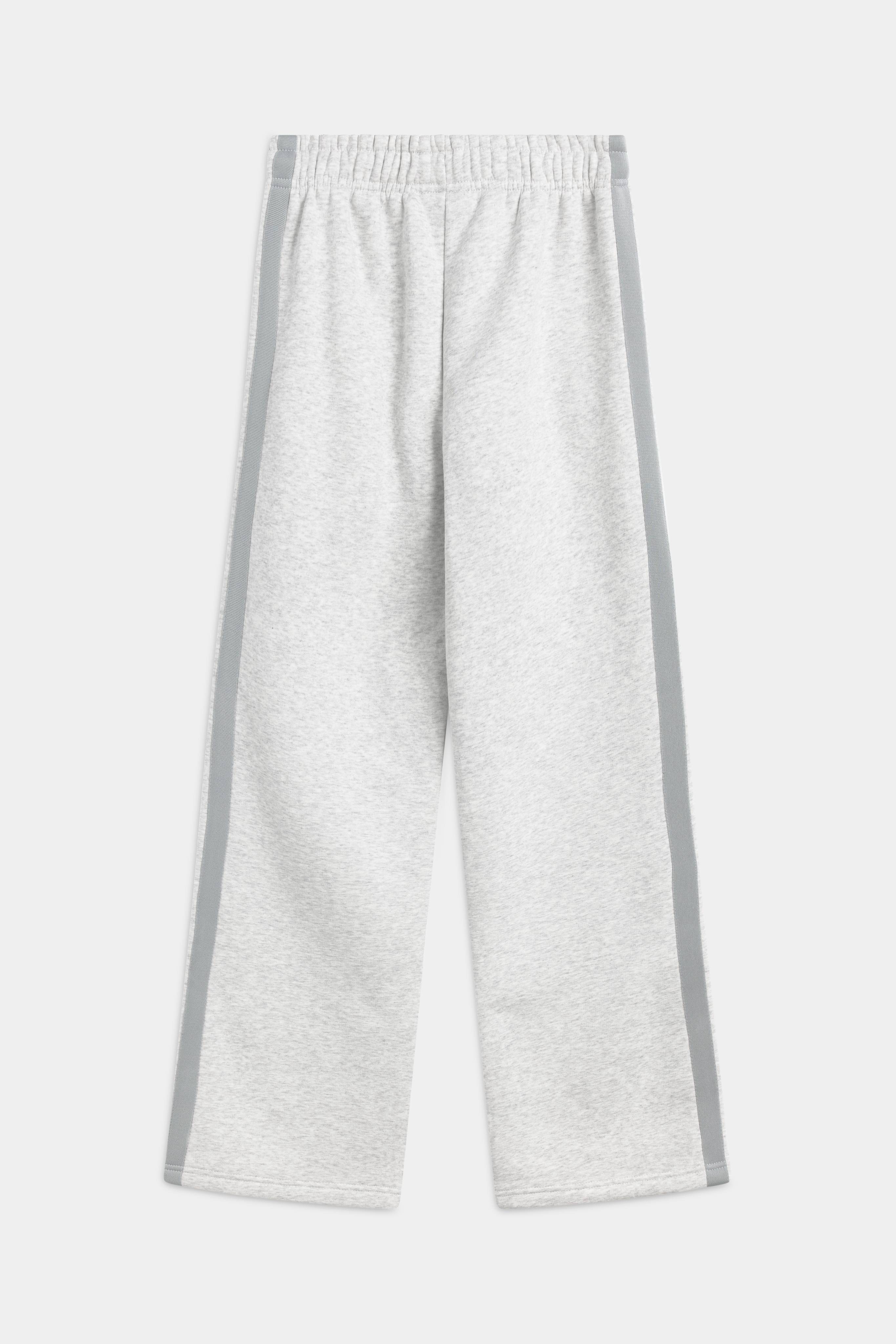 Back view of CASPARA women's All-Star straight-leg sweatpants in grey melange with side piping.